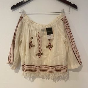 Brand new top from top shop. New with tags. Cross shoulder top